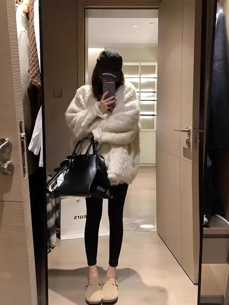 معطف علوي نسائي جديد لشتاء 2024 معطف ناعم منفوش من الفرو الصناعي بأكمام طويلة معاطف فضفاضة على الموضة الكورية معاطف نسائية وسترات ملابس