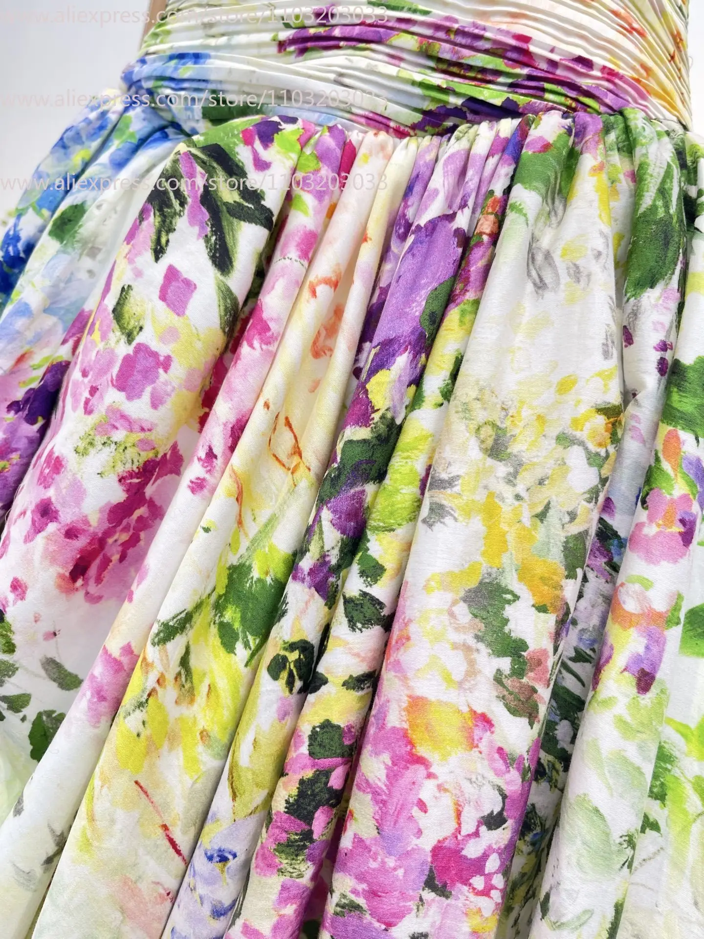 เดรสทรงเอไลน์สีเขียวลายดอกไม้พิมพ์ลายจีบระบายแขนกุดแบบใหม่ปี 2026