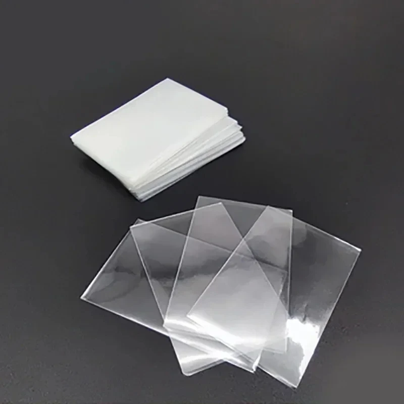 100Pcs/200Pcs 65*90mm Transparent Collection Card Film Card Game Protector Sleeves Card ID Protector Bag Waterproof Storage