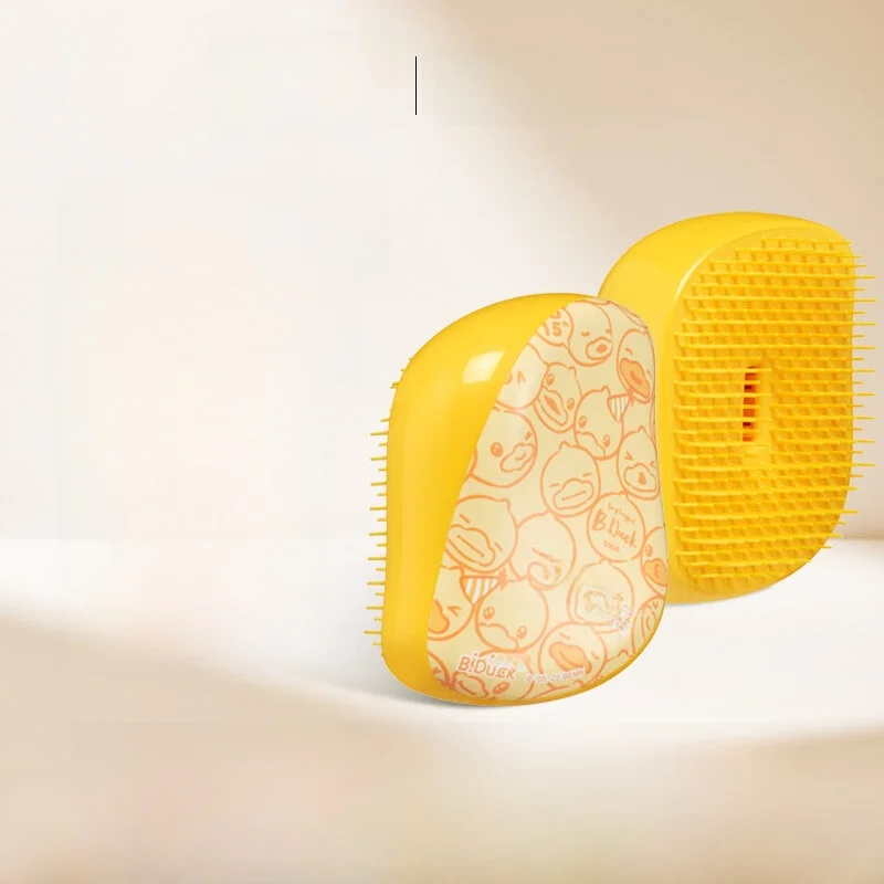 tangleteezer-queen's-collaboration-duckie-cushion-massage-comb-peigne-a-dents-souples-pour-tous-types-de-cheveux-design-portable-pour-la-maison-et-le-salon
