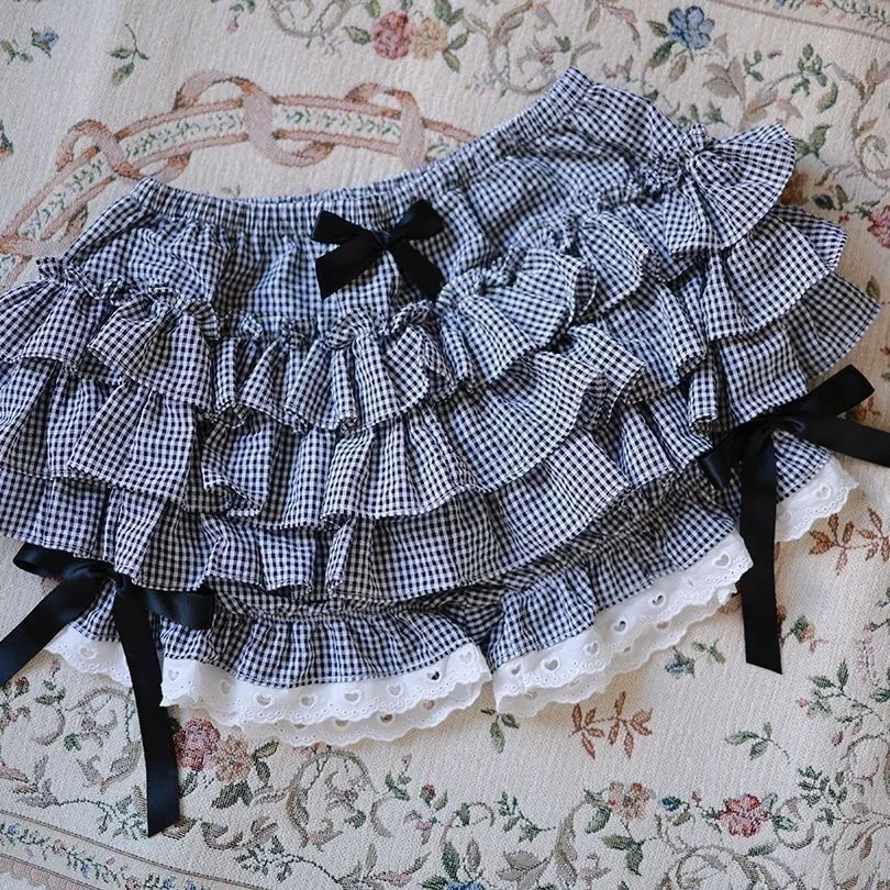 لوليتا كشكش تنورة صغيرة أبيض وأسود منقوشة منتفخ تنورة Kawaii لطيف الدانتيل الطبقات تنورة 2025 الصيف المرأة سراويل قصيرة