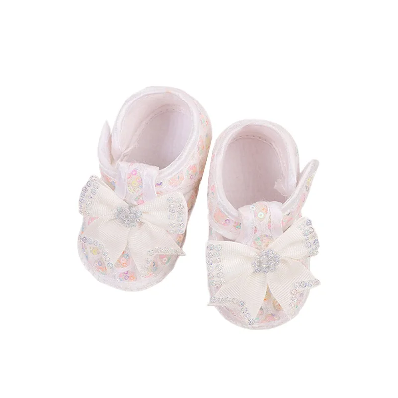 Mocasines para bebés y niñas, bonitos zapatos planos de suela suave con lazo y lentejuelas, zapatos antideslizantes para primeros pasos