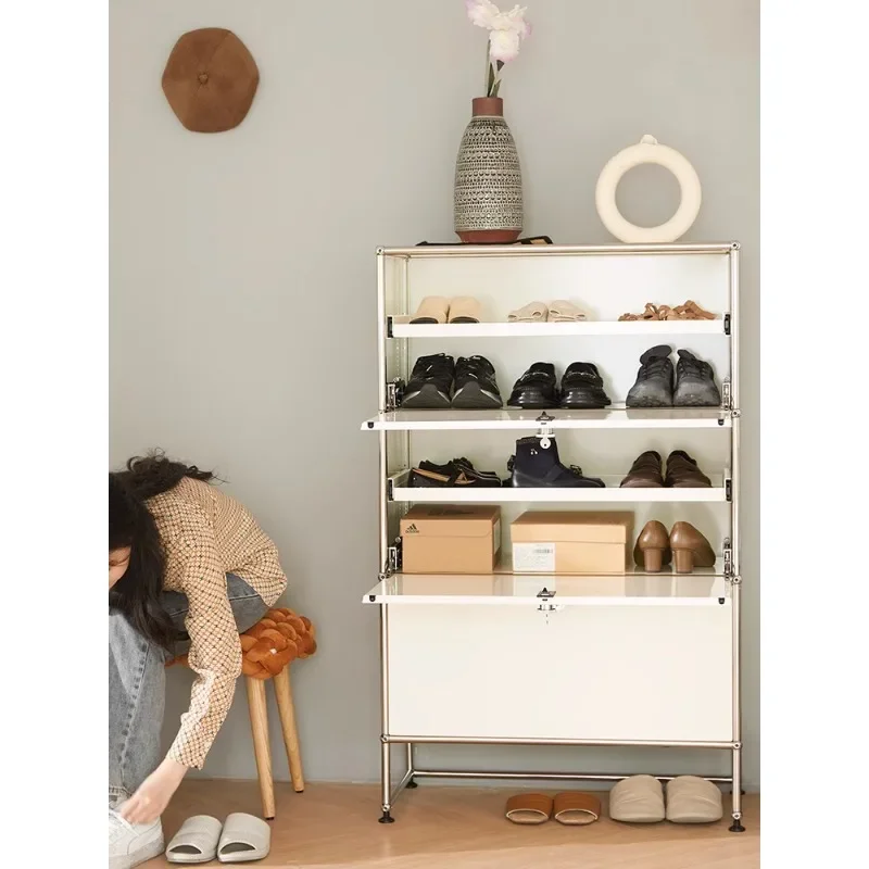 

A minimalist modern multifunctional storage cabinet for shoes. A medieval foyer cabinet at the entrance of a household