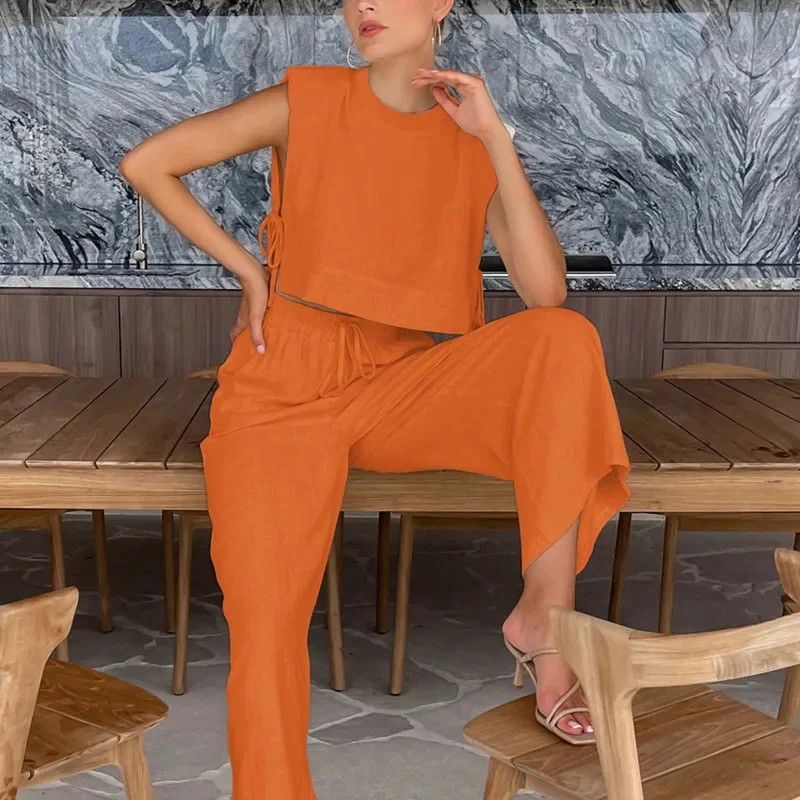 Sleeveless Linen Top With Matching Wide Leg Drawstring Pants Designed For Laid Back Summer Holidays Relaxed Everyday Dressing