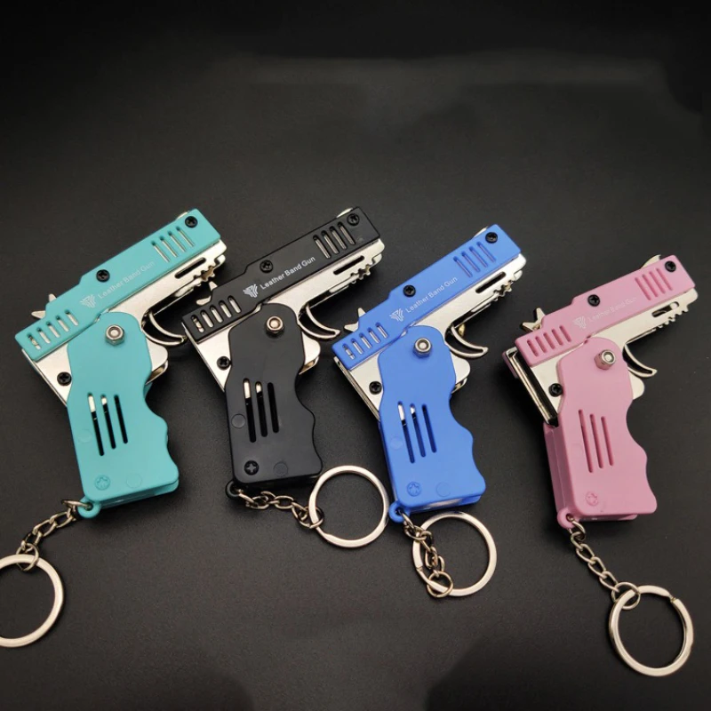 Alloy Plastic Keychain, Folding Rubber Band Gun with 6 Consecutive Firing Children\'s Shooting Toy, Soft Bullet Mini Pistol