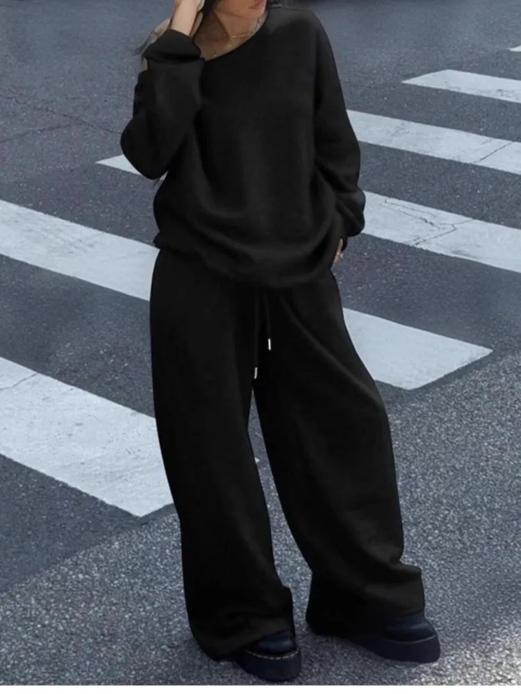 ชุดกางเกงสีพื้นสำหรับผู้หญิง ฤดูใบไม้ร่วงและฤดูหนาว สไตล์ลำลองแบบสปอร์ต เสื้อคอกลมทรงหลวม กางเกงขายาวทรงกว้าง ชุดสองชิ้น