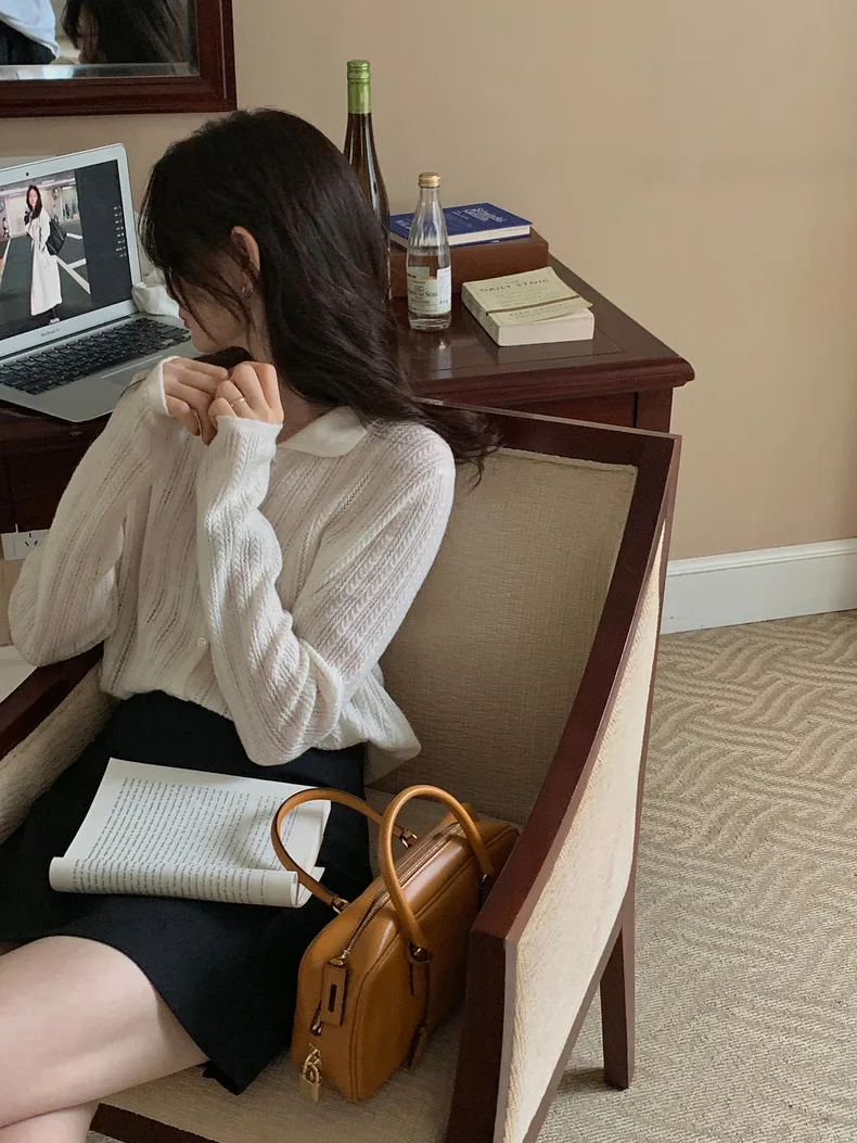 Doll collar cashmere cardigan women loose thin spring and autumn French hollow sweater coat high sense sweater Joker.