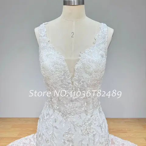 Hyr Lnyer Axelband V-ringning Rygglös Glänsande Pärlor Paljetter Spets Elegant Sjöjungfru Bröllopsklänning Riktiga Bilder Video 10 best sales importerade bröllopsklänningar - №4