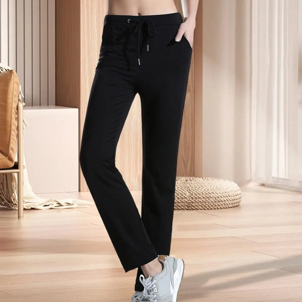 Pantaloni lunghi a compressione atletica attillati Pantaloni da yoga da donna con tasche Leggings fitness con coulisse regolabili casual