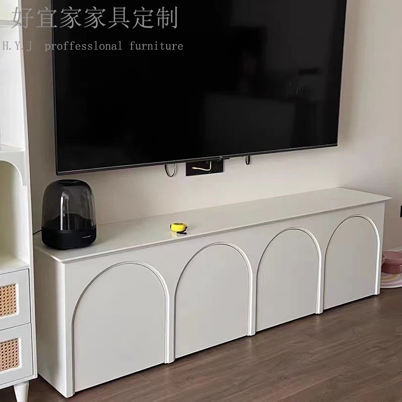 French TV cabinet, medieval arched door, audio-visual , cream color storage, simple floor , small apartment storage