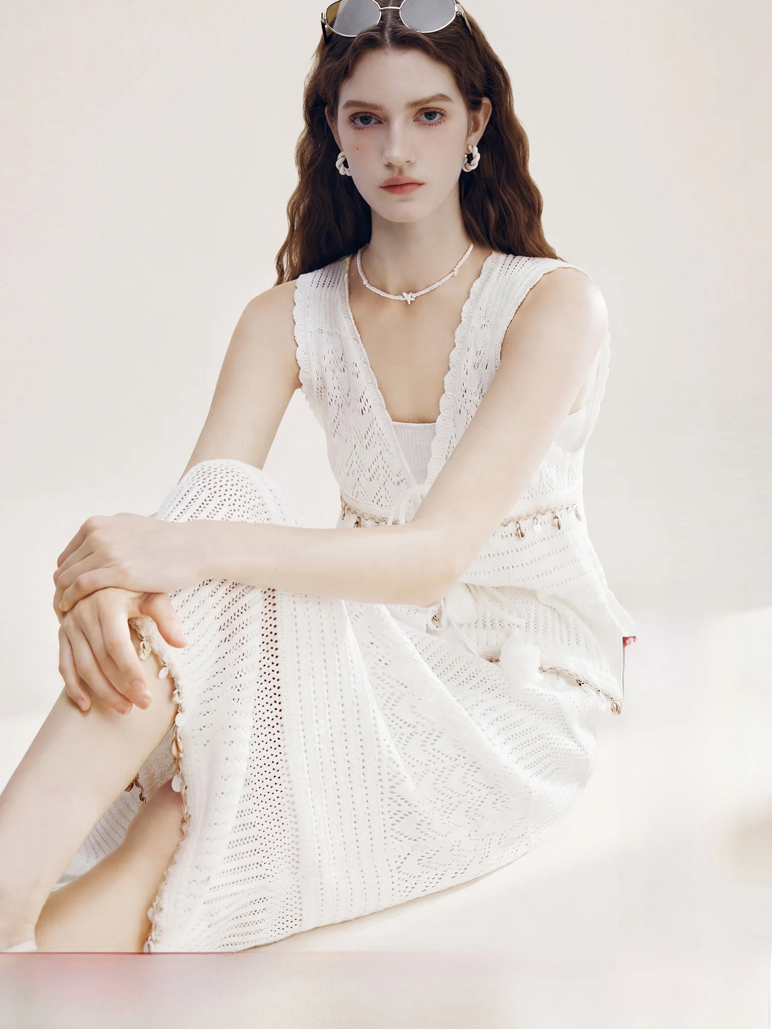 Chaleco de punto estilo bohemio para mujer, novedad de verano, top con cuello en V y cinturón, marca francesa Faman Xuan, nai...