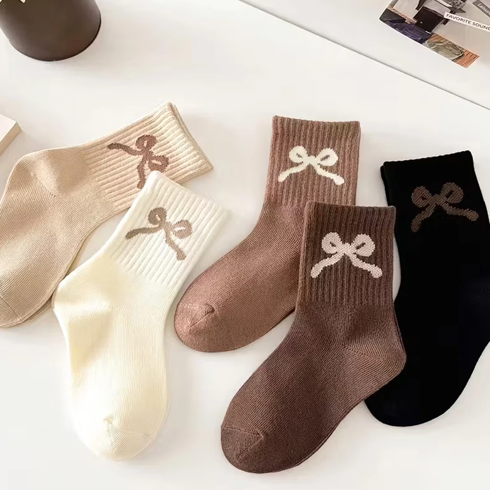 5 Pairs Stretchy Solid-Color Sports Socks for Girls, with Bow Patterns, Suitable for Wearing in Autumn and Winter Seasons.
