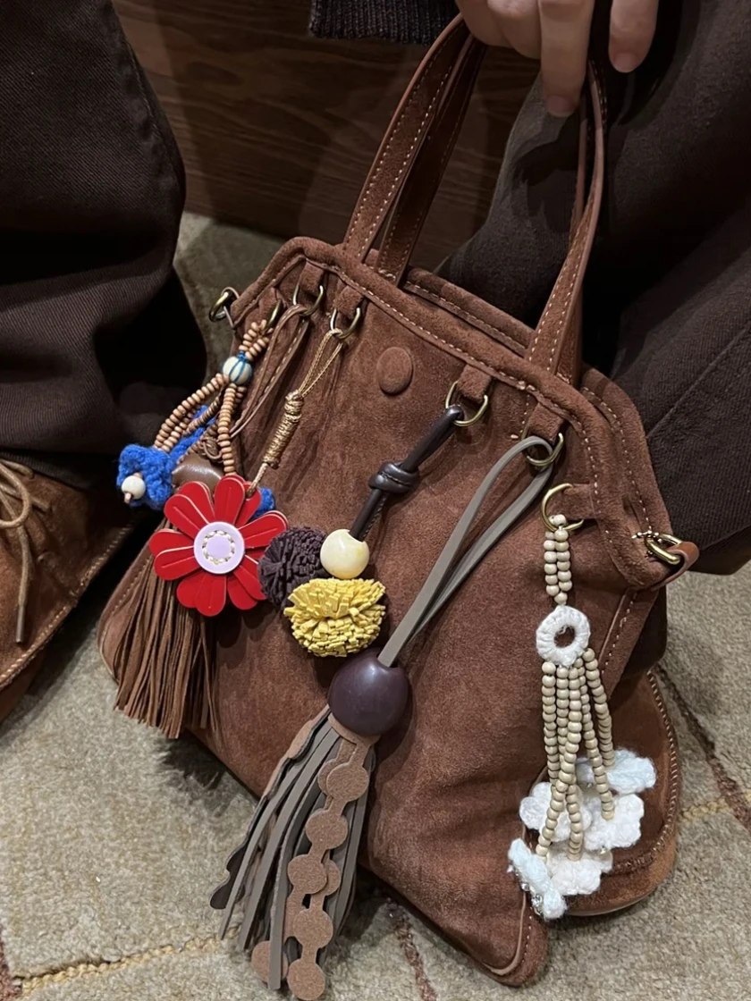 

Natural Suede genuine leather Tote Handbag Women Nubuck Leather Tassel pendant Casual Tote Bag Commute Bag Portable Handle Bag
