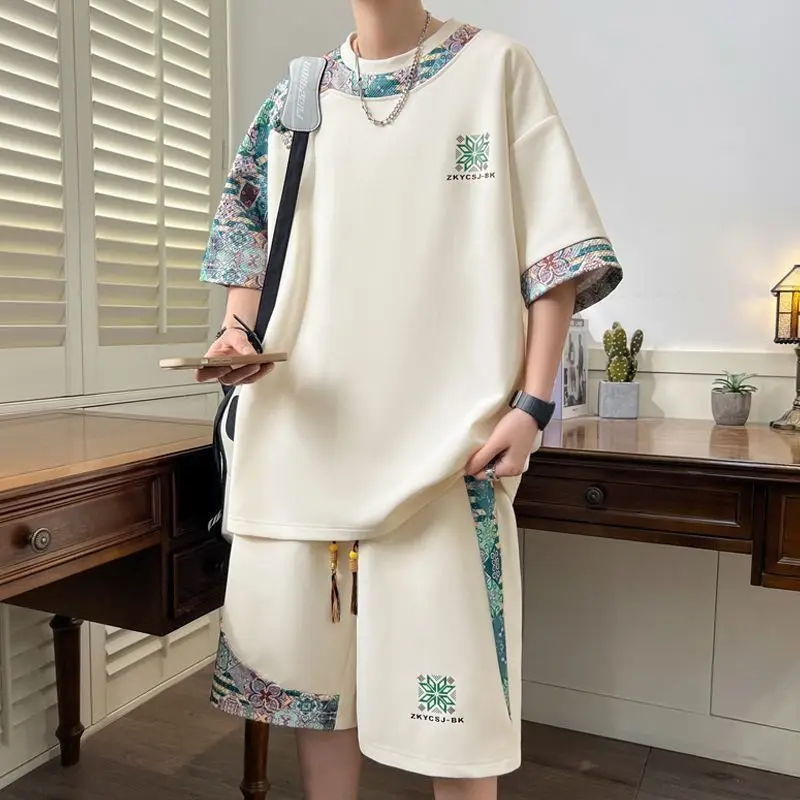 2026 New Men's M-6XL Oversized Sets Korean High Street Youth T-shirt Shorts 2 piece Set Men Trendy O Neck Top Designer Clothes