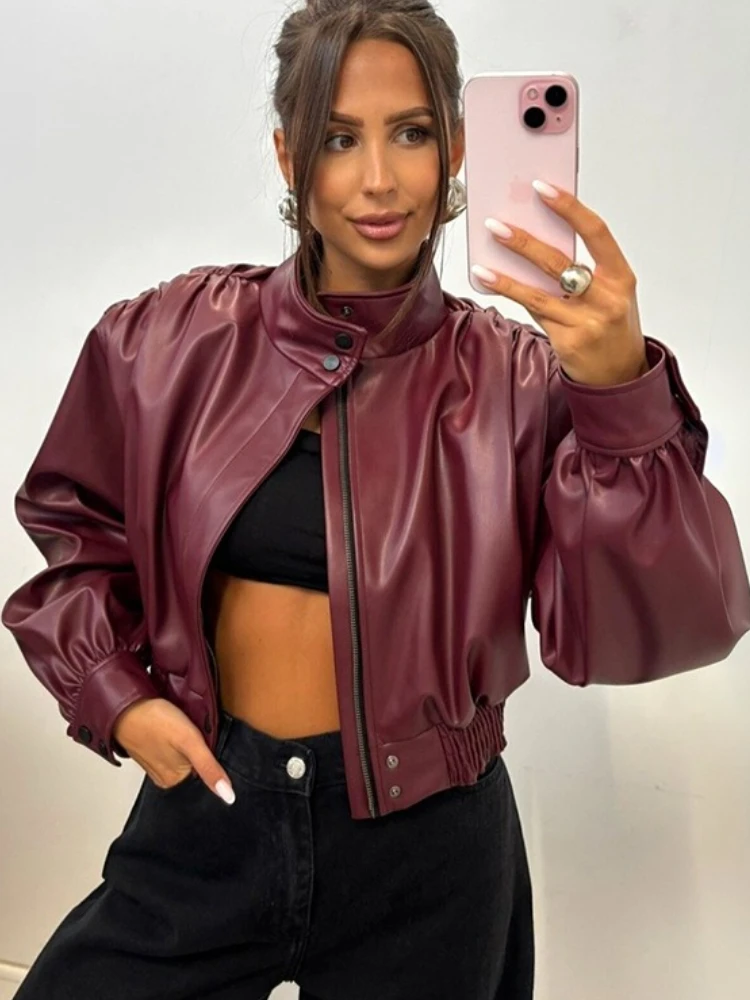 เสื้อแจ็คเก็ตหนังเทียมคอตั้งทรงสั้นสไตล์สตรีทแฟชั่น  แบบต่อผ้าสีพื้น  รุ่นใหม่สำหรับผู้หญิง