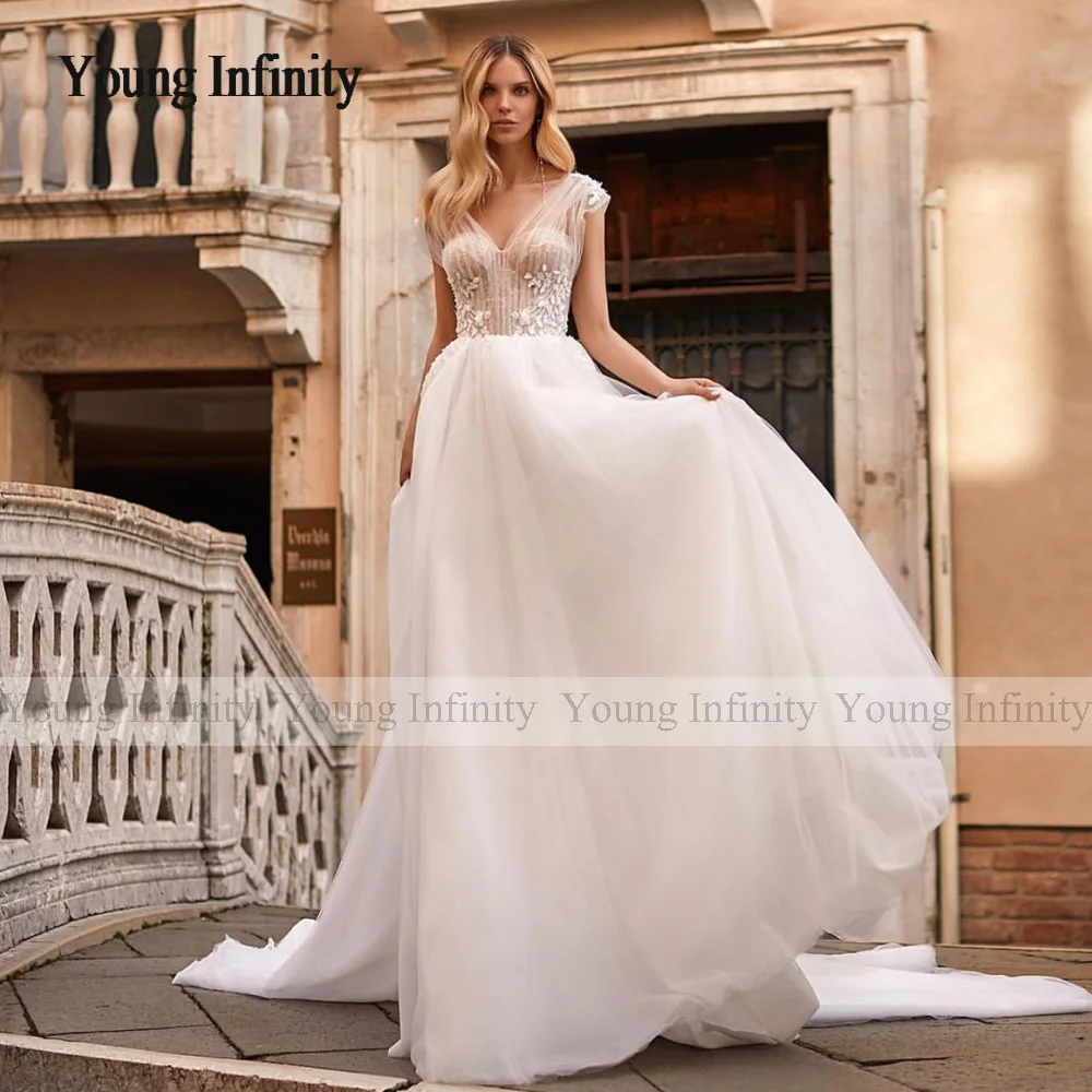 Romantic A Line Wedding Dress 2024 Bridal Gown V Neck Off Shoulder Backless Applique Chapel Train White Ivory Formal Woman Wear