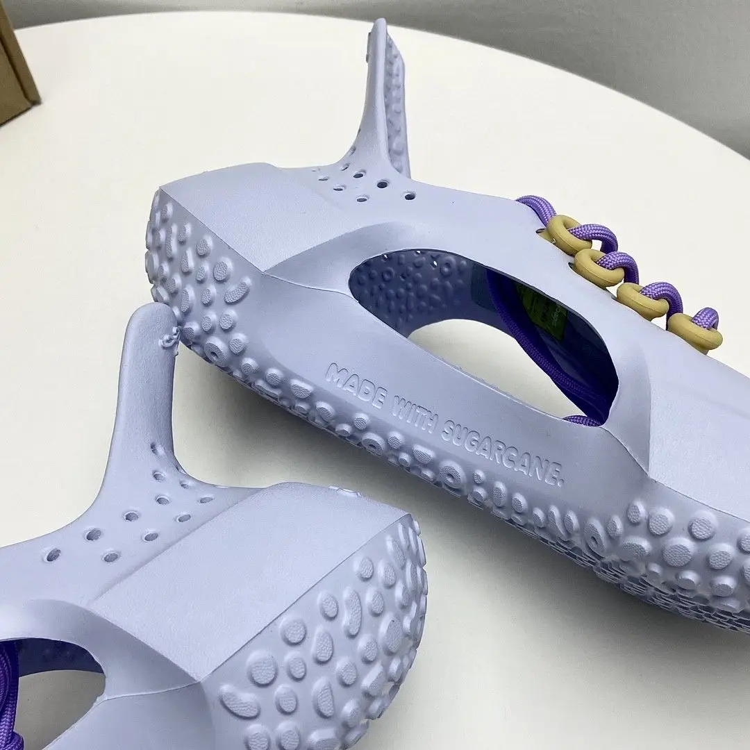 

New non-slip breathable perforated walking shoes comfortable ladies casual running shoes EVA surface men's casual sneakers