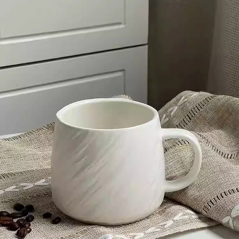 كوب سيراميك منزلي ياباني بمقبض جديد 500 مللي أكواب قهوة مكتبية بيضاء حديثة صلبة وبسيطة بنمط حجري عالي كوب شاي