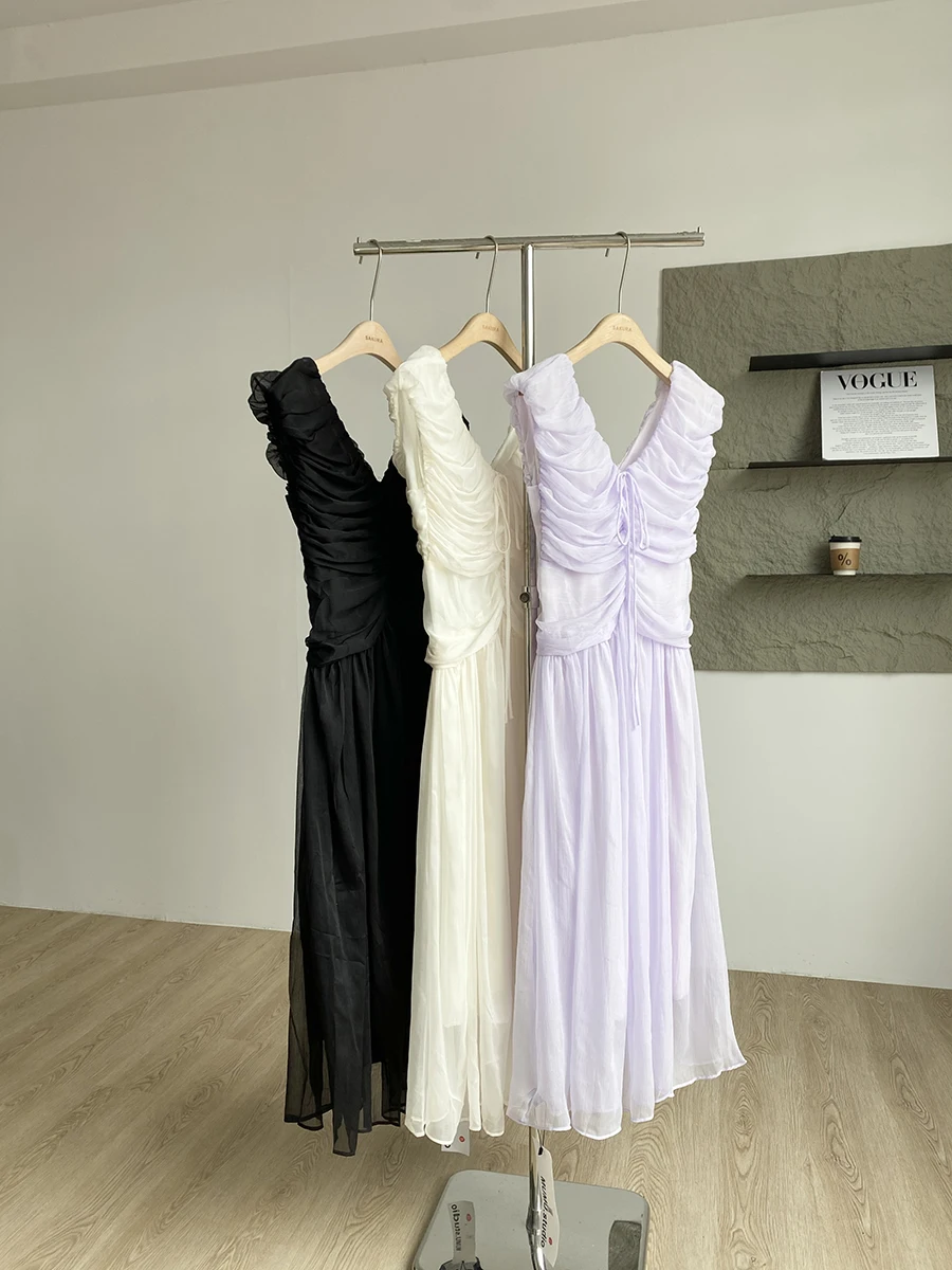 فستان نسائي صيفي أنيق بياقة على شكل V بدون أكمام مكشكش فستان طويل للسيدات بلون سادة وأربطة على شكل حرف A