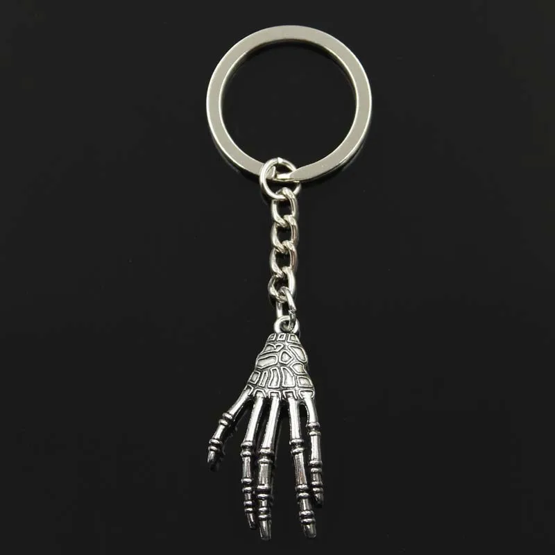 New Fashion Keychain 39x20mm Skeleton Skull Claws Pendants DIY Men Silver Color Car Key Chain Ring Holder Souvenir For Gift