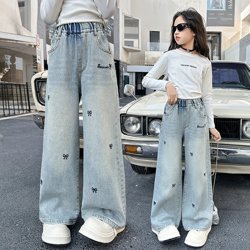 Modische Mädchenjeans mit Schleifenstickerei, neue Frühlings- und Herbstkollektion, 4-14 Jahre, weit geschnittene Denim-Hose mit Allover-Print für Kinder