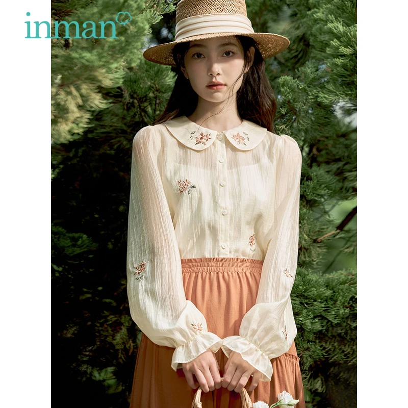 

INMAN Women Shirts 2023 Spring Bishop Sleeve Doll Collar Loose Blouse Flower Embroidery Wrinkle Texture Fabric Vintage Tops