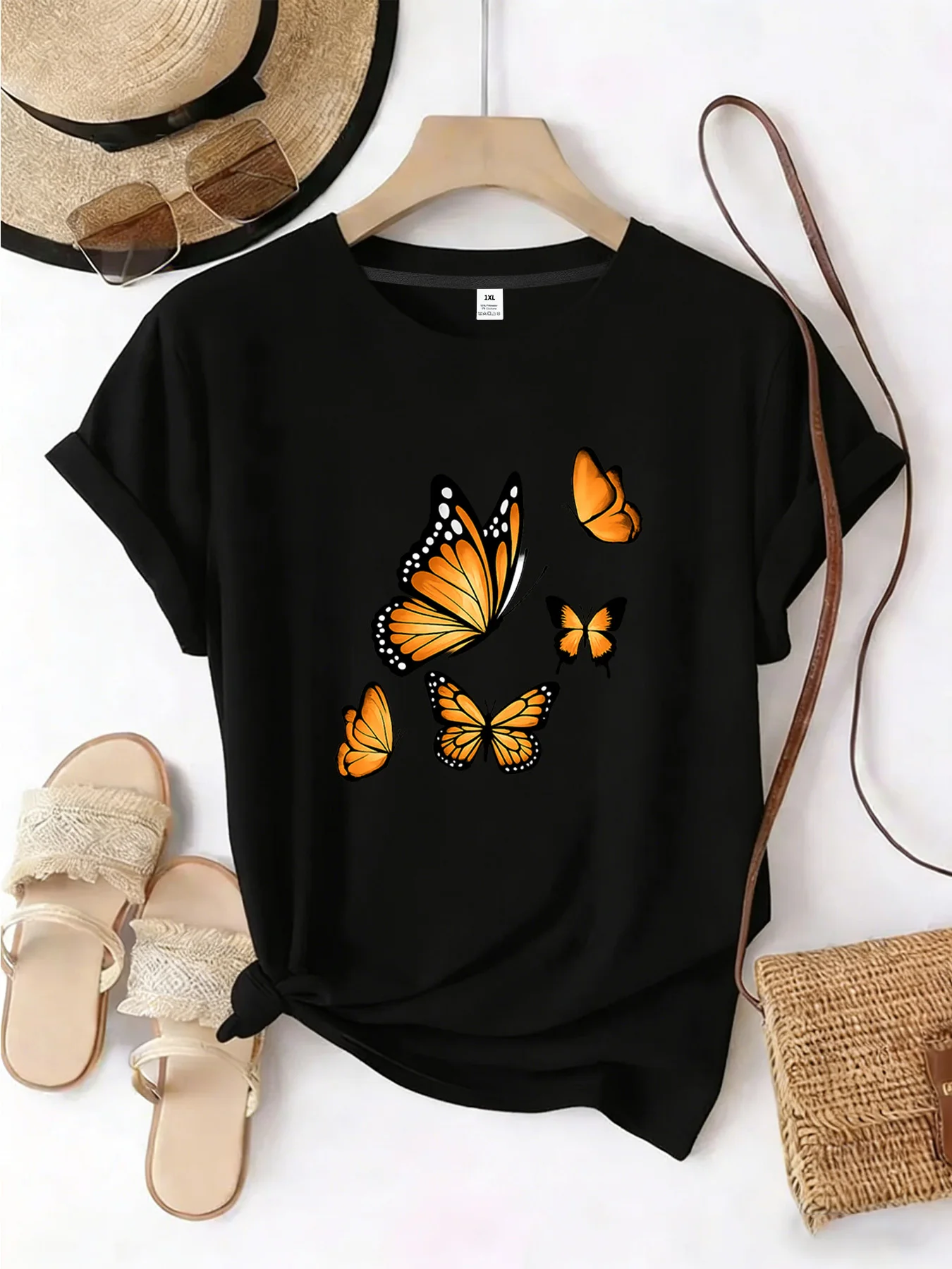 

【YJ00067】Женская футболка больших размеров с круглым вырезом, короткими рукавами, эластичными рукавами до локтя и модными принтами, с изображением желтой бабочки.