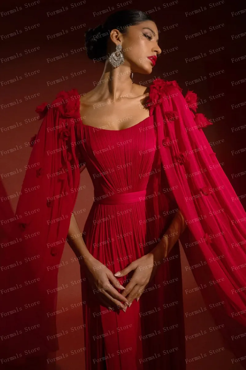 ชุดราตรีสีแดงสุดชิคพร้อมดีไซน์จับจีบและแขนไหลมีสีหนาและเงาที่โดดเด่น เน้นความงามของผู้หญิง