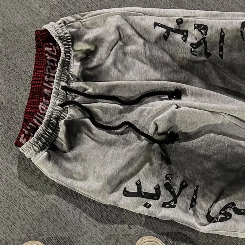 Stile High Street, design di nicchia, moda alla moda, pantaloni casual stampati con lettere, pantaloni versatili per lo shopping Instagram