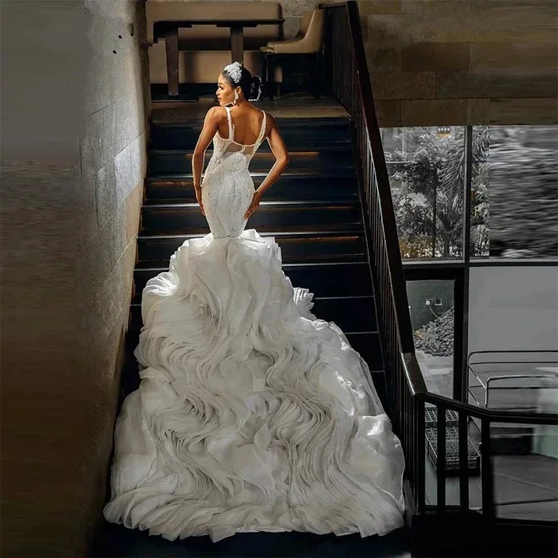 

Customized Mermaid Sleeveless Deep V-Neck Wedding Dresses Spaghetti Strap Lace Beads Romantic Ruffles Train Vestido De Novia