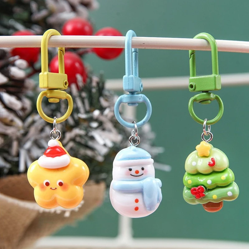 น่ารักคริสต์มาสเรซิ่นพวงกุญแจจี้ DIY การ์ตูน Santa Snowman พวงกุญแจร้อนขายกระเป๋า Charm กระเป๋าเป้สะพายหลังตกแต่งของขวัญ