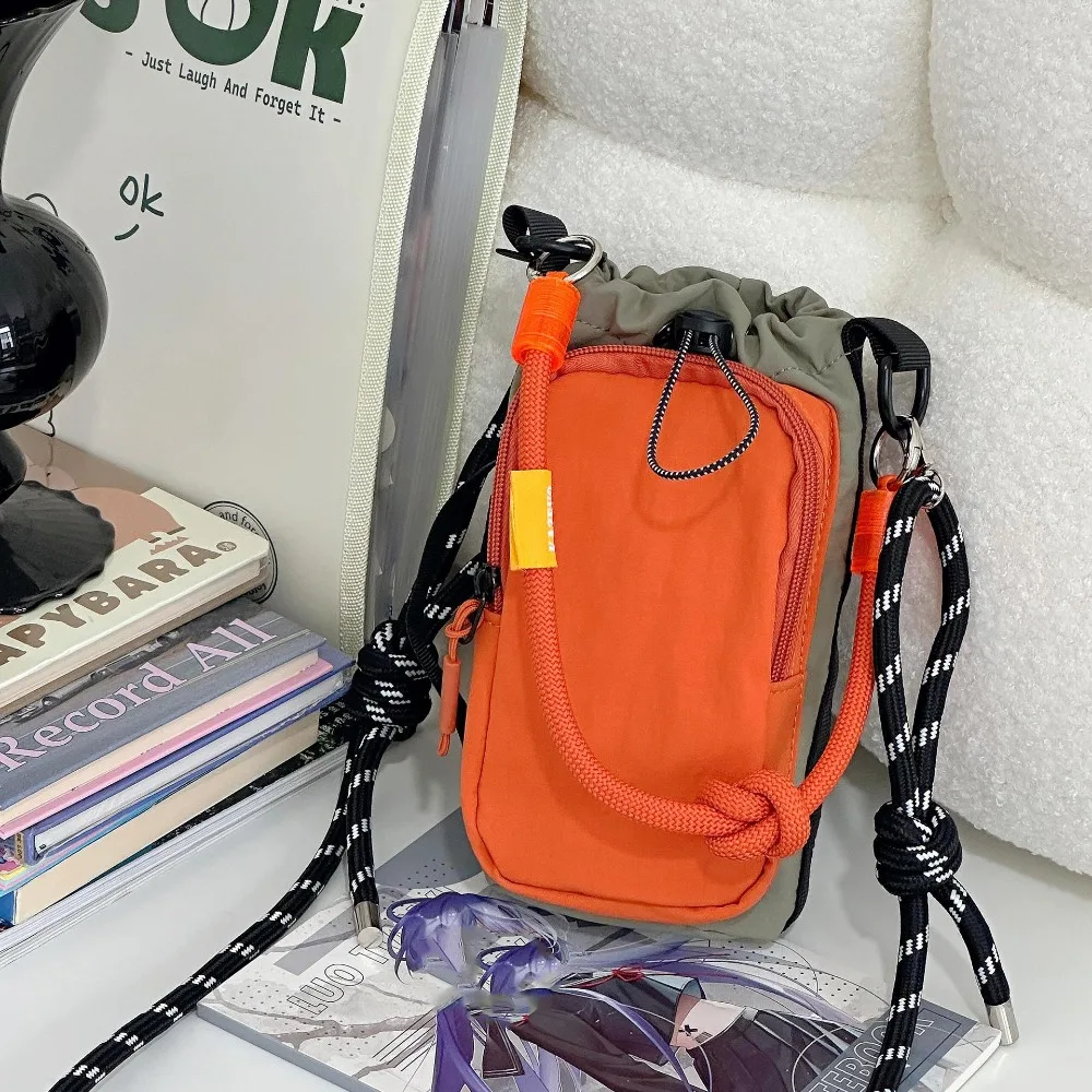 

Harajuku Sports Nylon Shoulder Bag Coin Pouch Nylon Rope Drawstring Crossbody Bag Casual Solid Color Mobile Phone Pack Travel