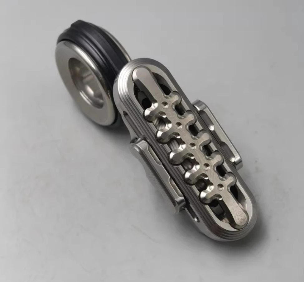 تستخدم EDC Play Wu Le Zhi التيتانيوم الصلب العظام + العين الاصطناعية مجموعة ألعاب الضغط