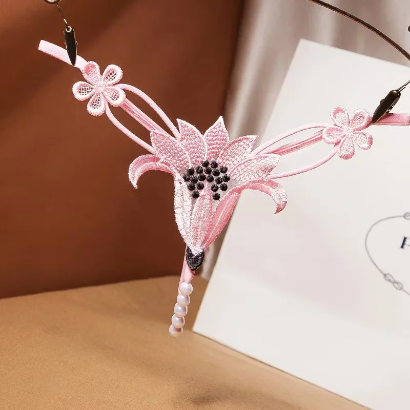 섹시한 속이 빈 진주 마사지, 탄력 있고 매혹적인 꽃무늬 끈 팬티