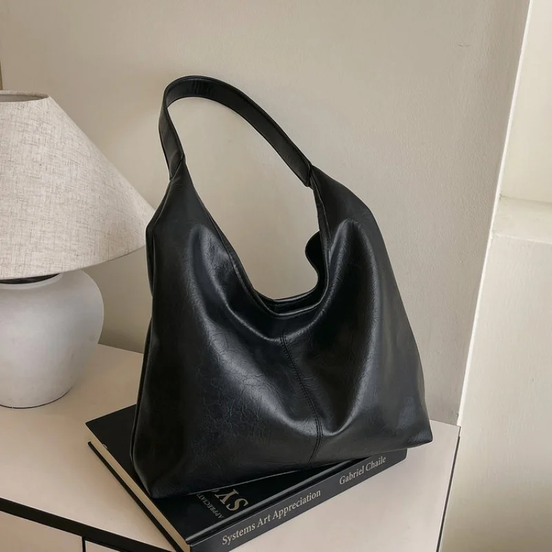 

2025 Новая элитная брендовая женская кожаная сумка на плечо известного дизайнера, элегантная простая парижская сумка ​