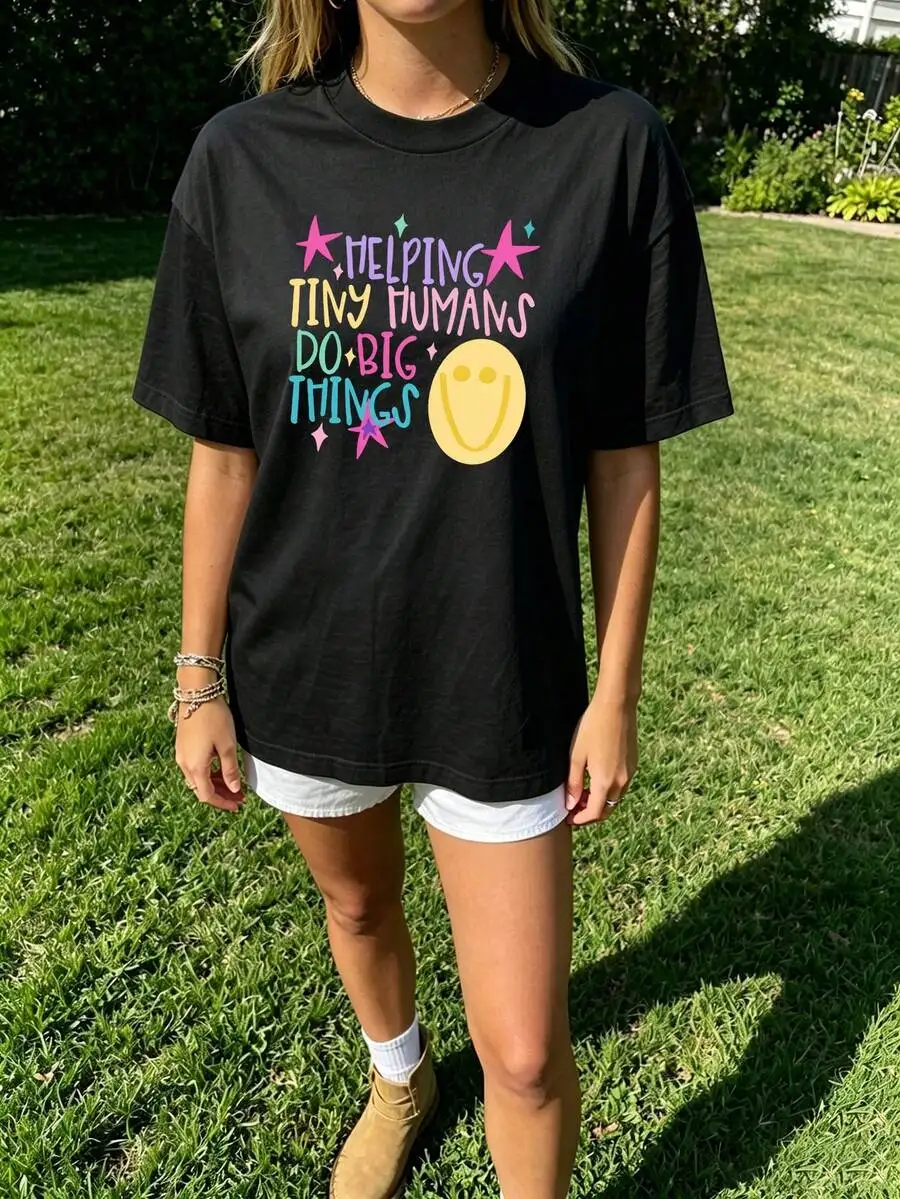 Helping Tiny Humans Do Big Things Teacher Graphic Tee Cute Face Star Print Elementary School Kindergarten Teacher T-Shirt