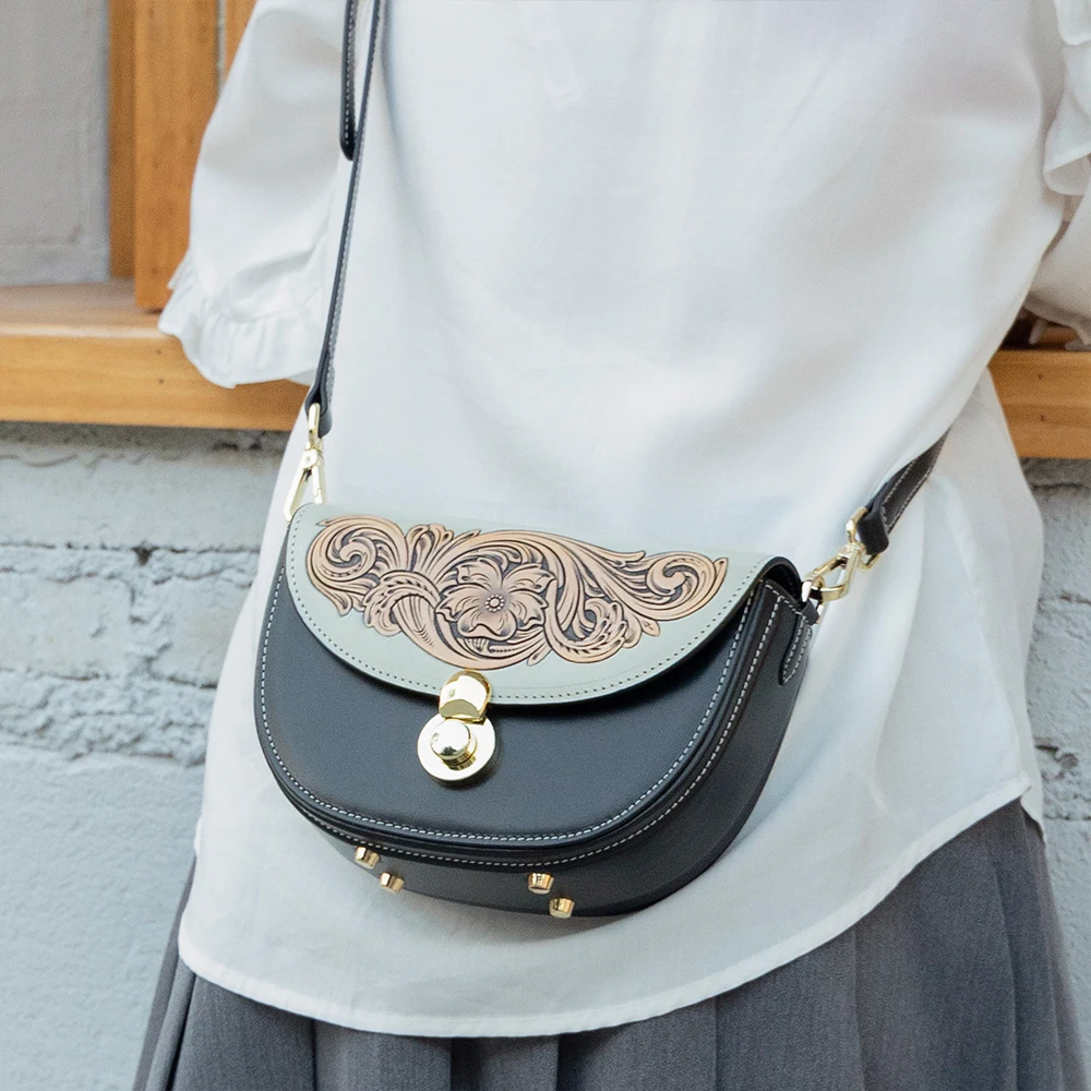 Vegetable tanned leather carved women's shoulder bag fashionable crossbody bag niche design retro saddle bag  for women
