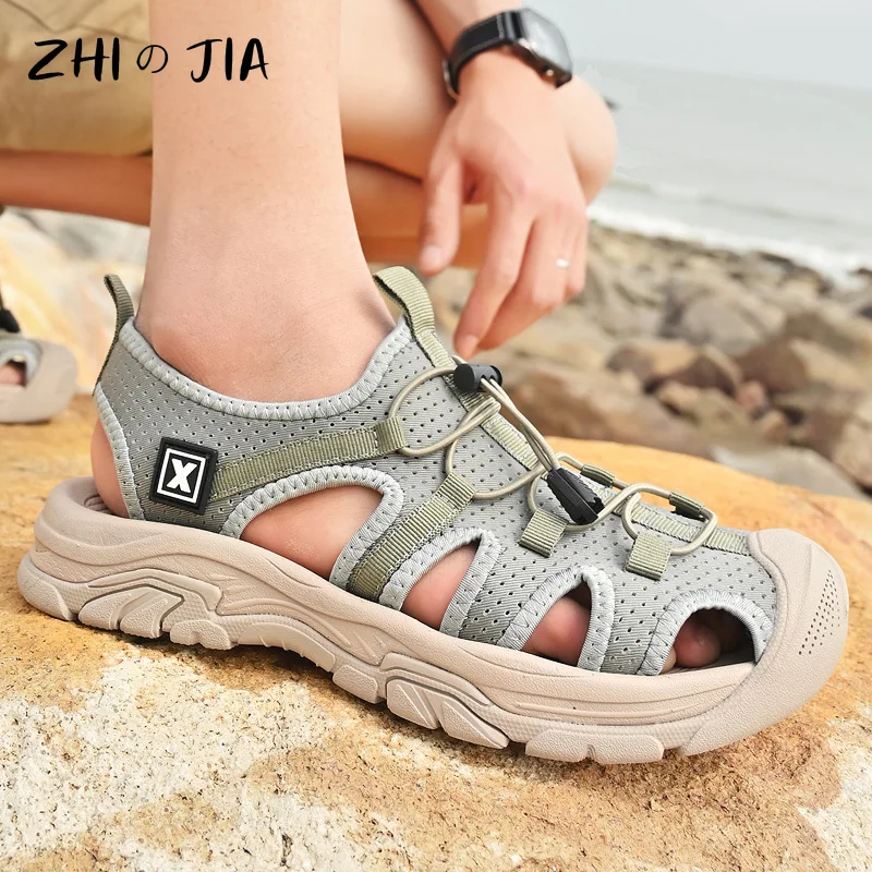أحذية شاطئ مجوفة صيفية قابلة للتنفس للرجال صنادل رياضية خارجية مانعة للانزلاق أحذية كاجوال كبيرة مريحة سهلة الارتداء أحذية مسطحة