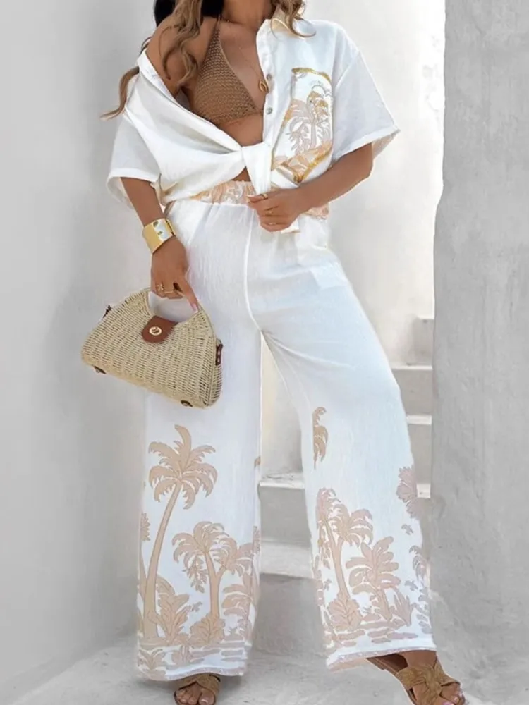 

Модные комплекты в стиле бохо с принтом, женские повседневные рубашки с короткими рукавами и отложным воротником, топы + широкие брюки, комплект из 2 предметов, женский праздничный пляжный новый