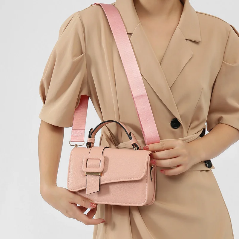 

Элегантная и стильная, это модная и модная женская сумка на одно плечо с универсальным цвета макарон и является током.