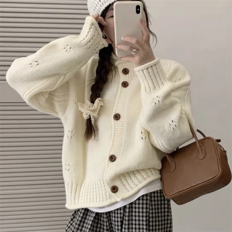 

Korean retro hollow knitted cardigan coat women's autumn and winter loose curled stand-up collar design short sweater jacket top