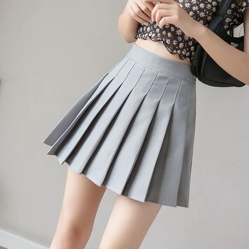 Autumn women's high waisted pleated skirt short , college style Korean version solid color anti glare A-line   sexy short skirt
