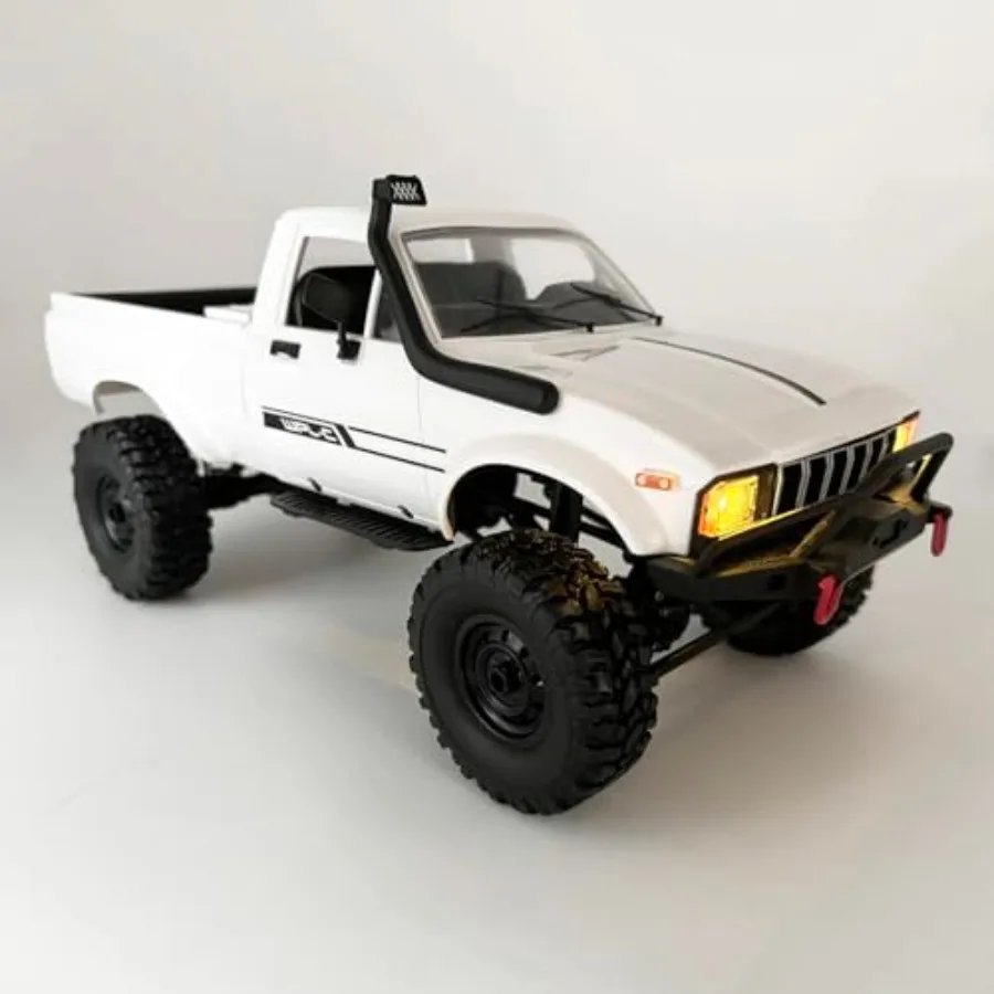RC crawler truck for off-road terrain, ABS plastic body in matte black, high-torque motors and precise 2.4G proportional steeri