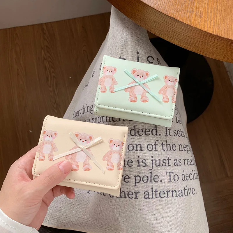 Portefeuille court en forme d'arc pour femmes, portefeuille porte-cartes à changement ample multifonctionnel à trois volets pour étudiantes, dessin animé et mignon