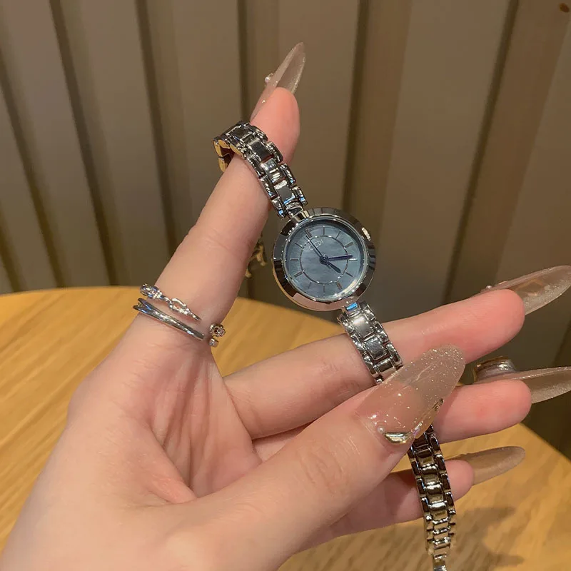 Fashion student trendquartz watch simple water release elegant light luxury niche steel belt women's watch new2025 birthday gift