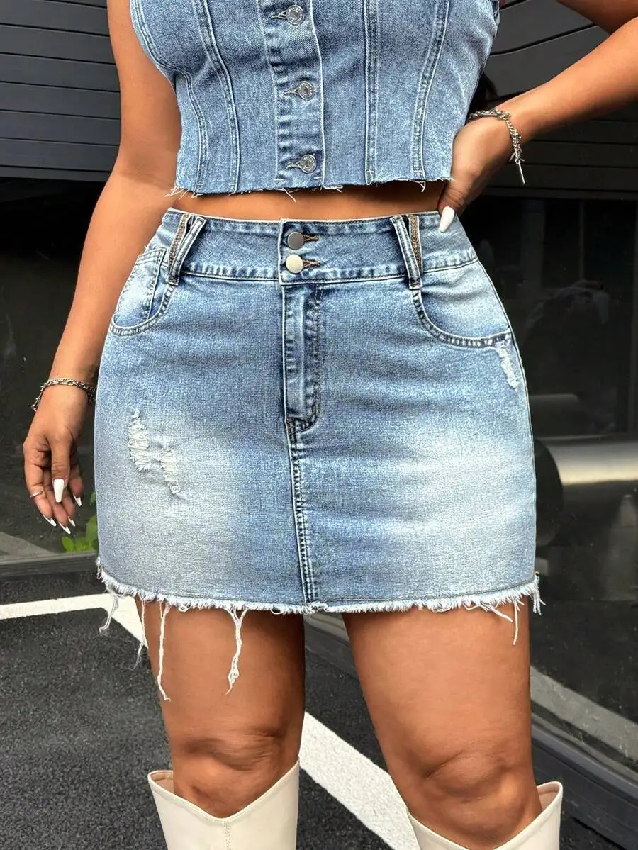 

High-Waisted Distressed Denim Mini Skirt With Button Closure And Raw Hem