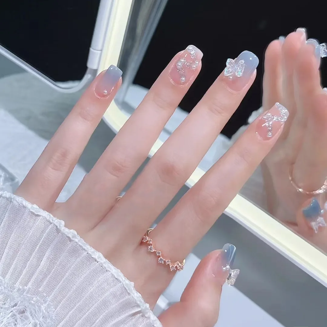 Kurzes Eis transparent blau Schmetterling Nagel Patch fertiges Produkt tragen Nagel verbesserungen Frauen Nagels tücke falsche Nägel