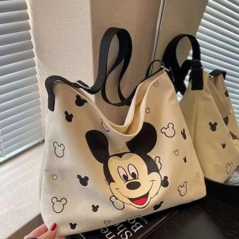 

Disney Mickey Ins Canvas Bag Women's Crossbody Bag 2025 Summer New Japanese Large-capacity Cartoon Print Student Shoulder Bag