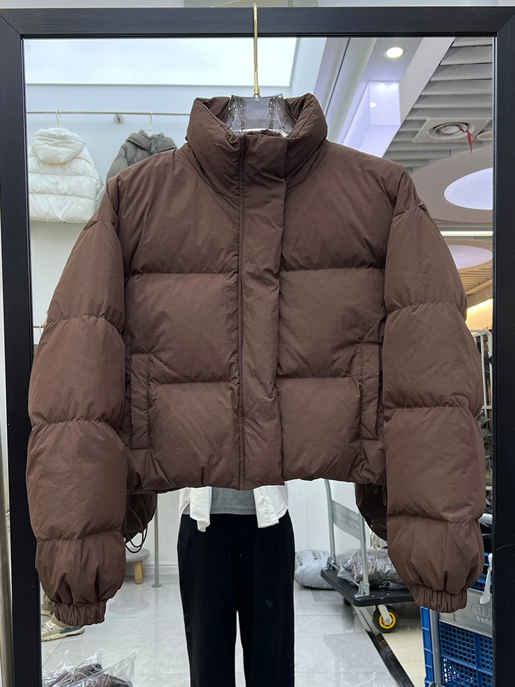 Winter neue koreanische Version kurzer Stil Stehkragen Daunenjacke Damen dicker warmer und gemütlicher weißer Entendaunenmantel trendy