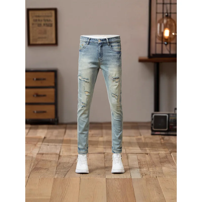 جينز ممزق وسيم للشارع روفيان لعام 2025 للرجال ذو اتجاه حنين عتيق بقصة ضيقة وأقدام صغيرة سراويل مخصصة متعثرة